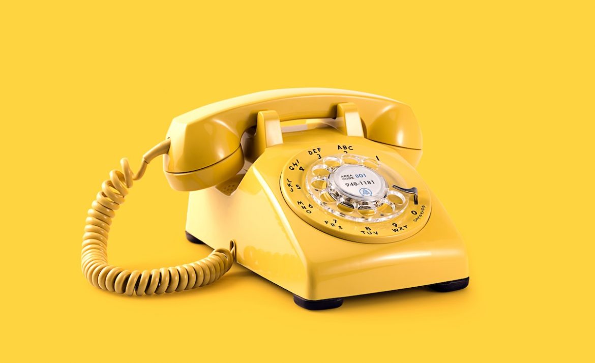 yellow rotary telephone